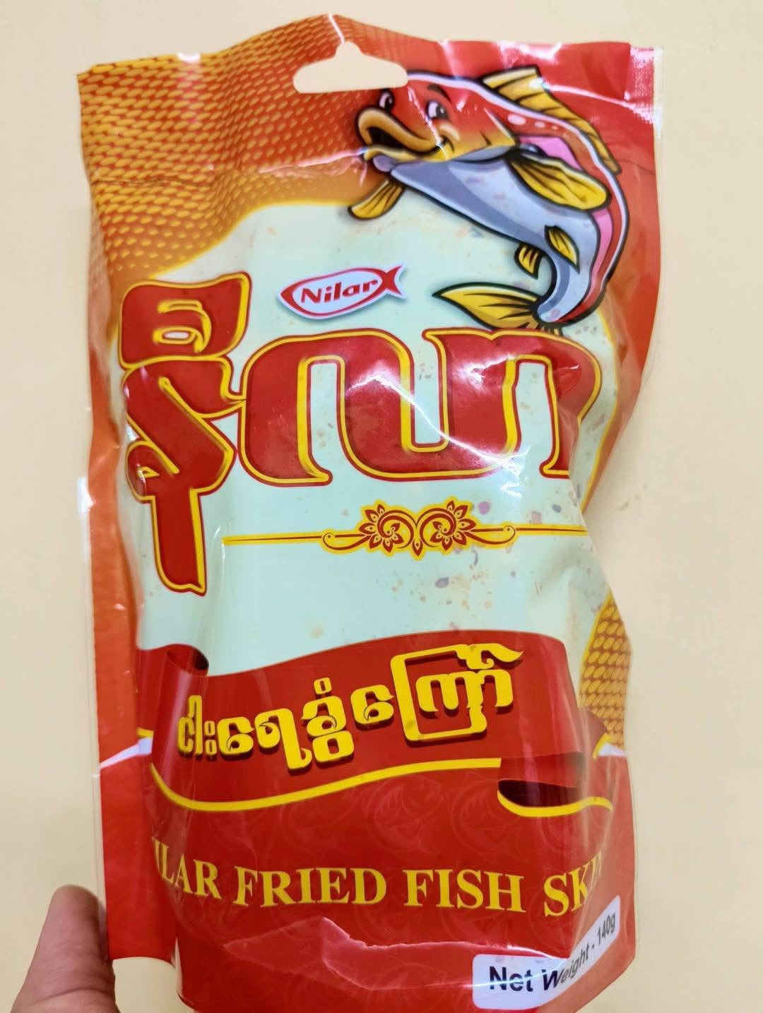 နီလာ ငါးအရေခွံကြော် အစပ် 140g